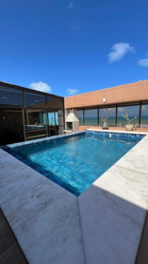 Cobertura com piscina privativa e vista para o mar
